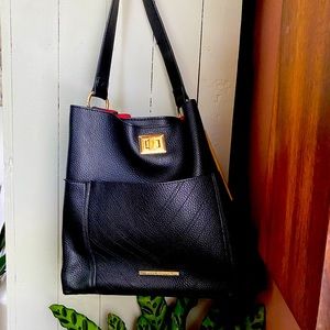 Steve Madden Purse. Black with red suede, two compartment interior